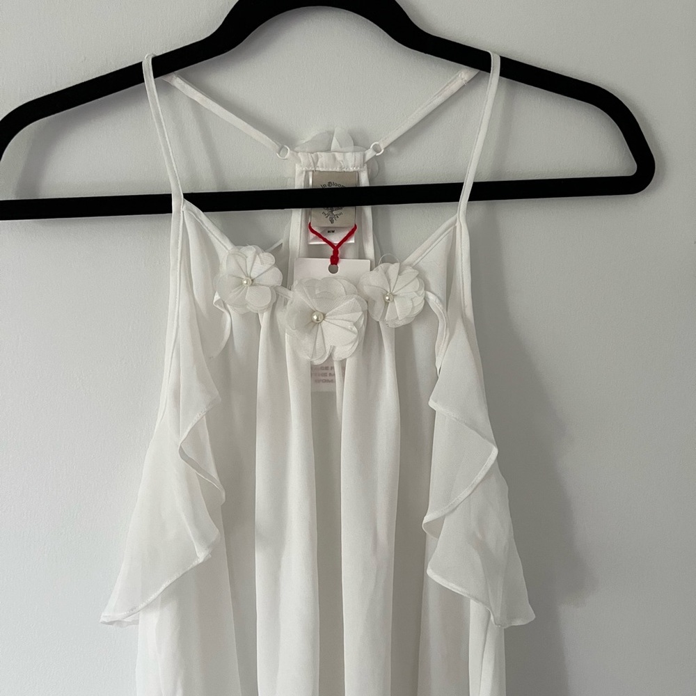 Y2K inspired white flowy tank top with floral details
